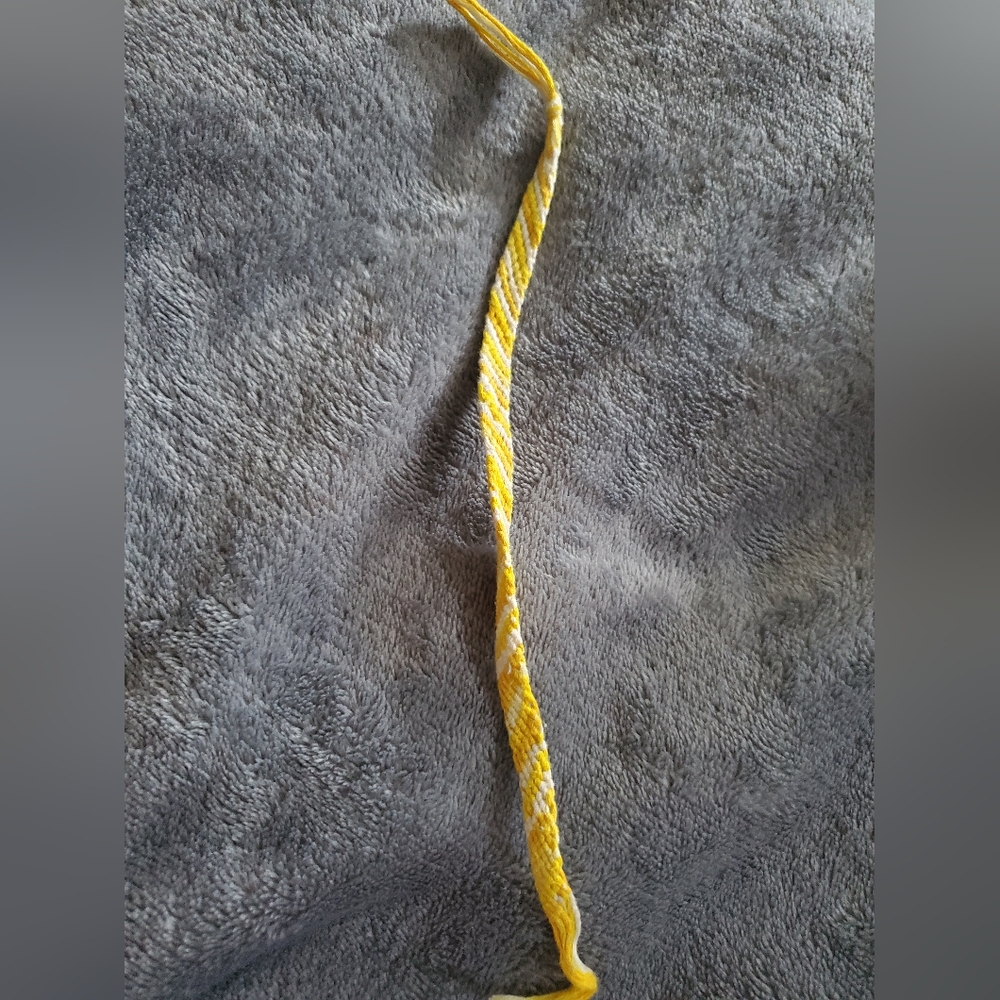 Yellow and White handmade Friendship Bracelet